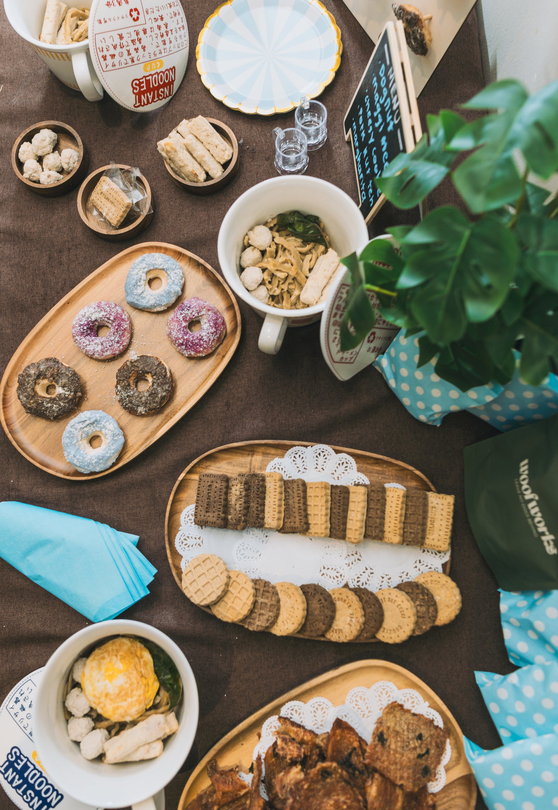 table full of customised dog-friendly treats at a dog party at a dog-friendly event space